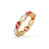 Gold ring with red gemstones and diamonds on a white background